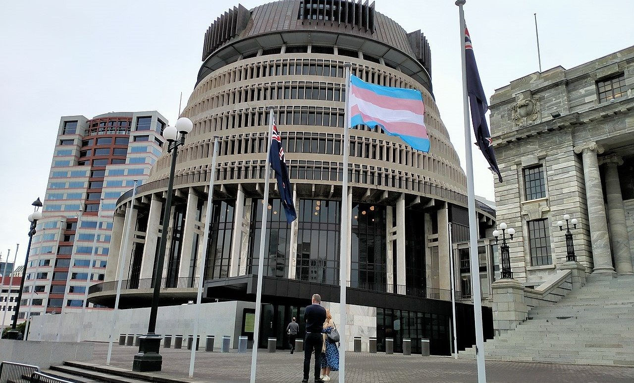 the_transgender_flag_flies_on_the_forecourt_of_new_zealand-s_parliament_flanked_by_the_new_zealand_flag.jpg