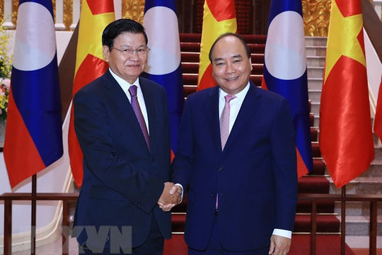 Thủ tướng Lào đến Việt Nam đồng chủ trì Kỳ họp Ủy ban Liên Chính phủ